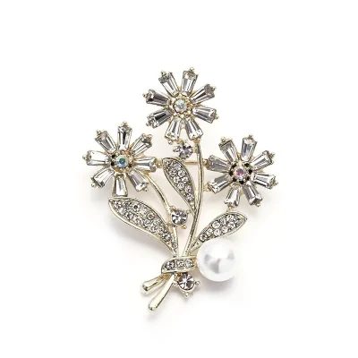 Gold tone mixed crystal contemporary flower brooch